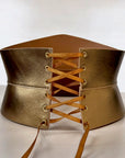 Aria Margo gold Italian leather corset belt with an hourglass silhouette and satin lace-up front closure.