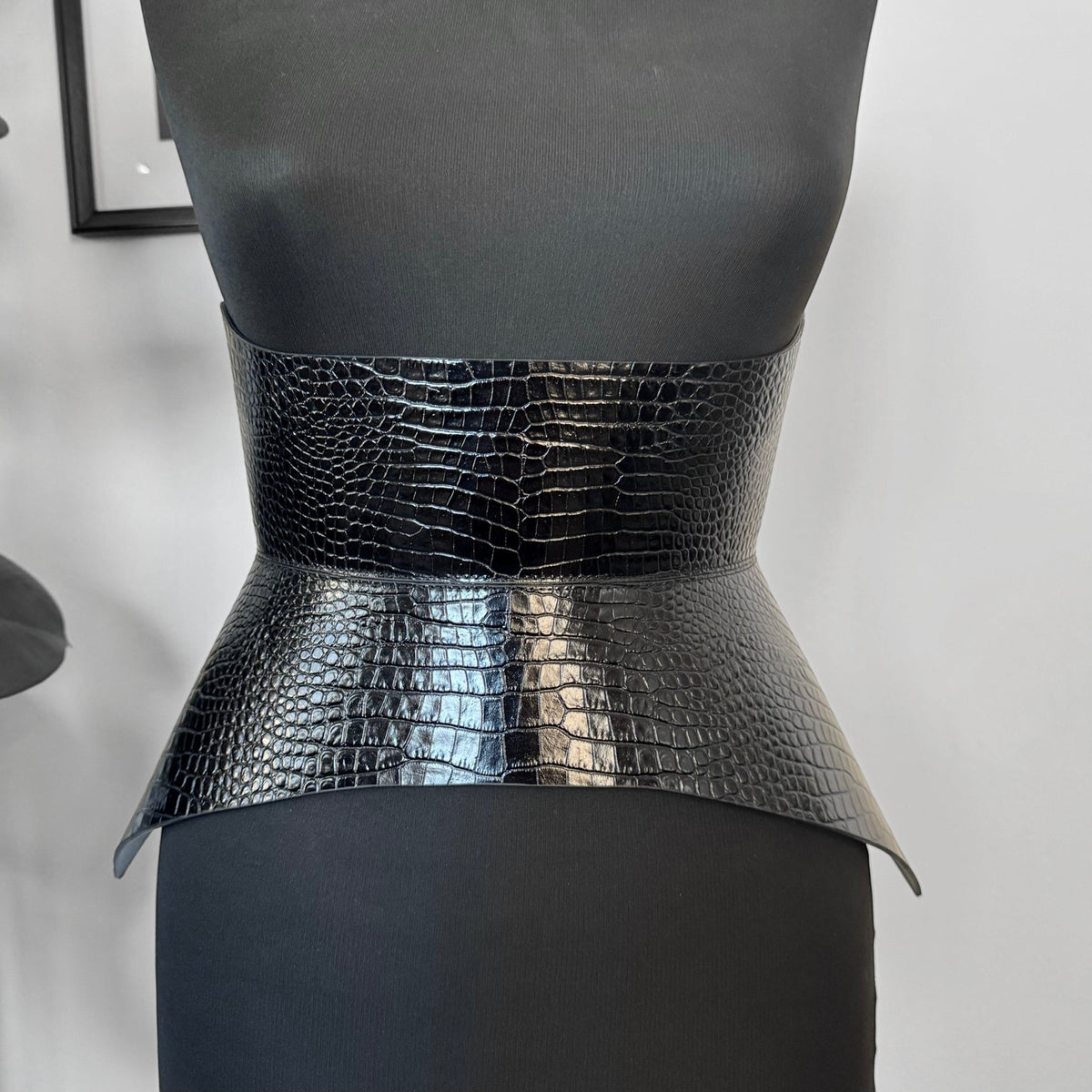 Aria Margo black croc-embossed Italian leather corset belt with a structured waist-defining silhouette.