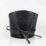 Aria Margo black croc-embossed leather waist belt with a wrap-around cord tie and structured silhouette.