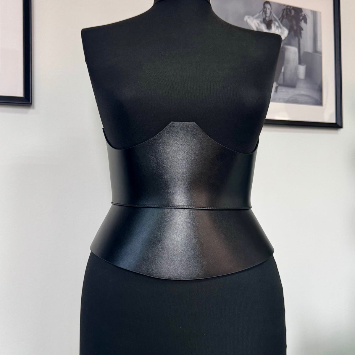 Aria Margo black Italian leather corset belt designed to sit under the bust for a defined waist silhouette.