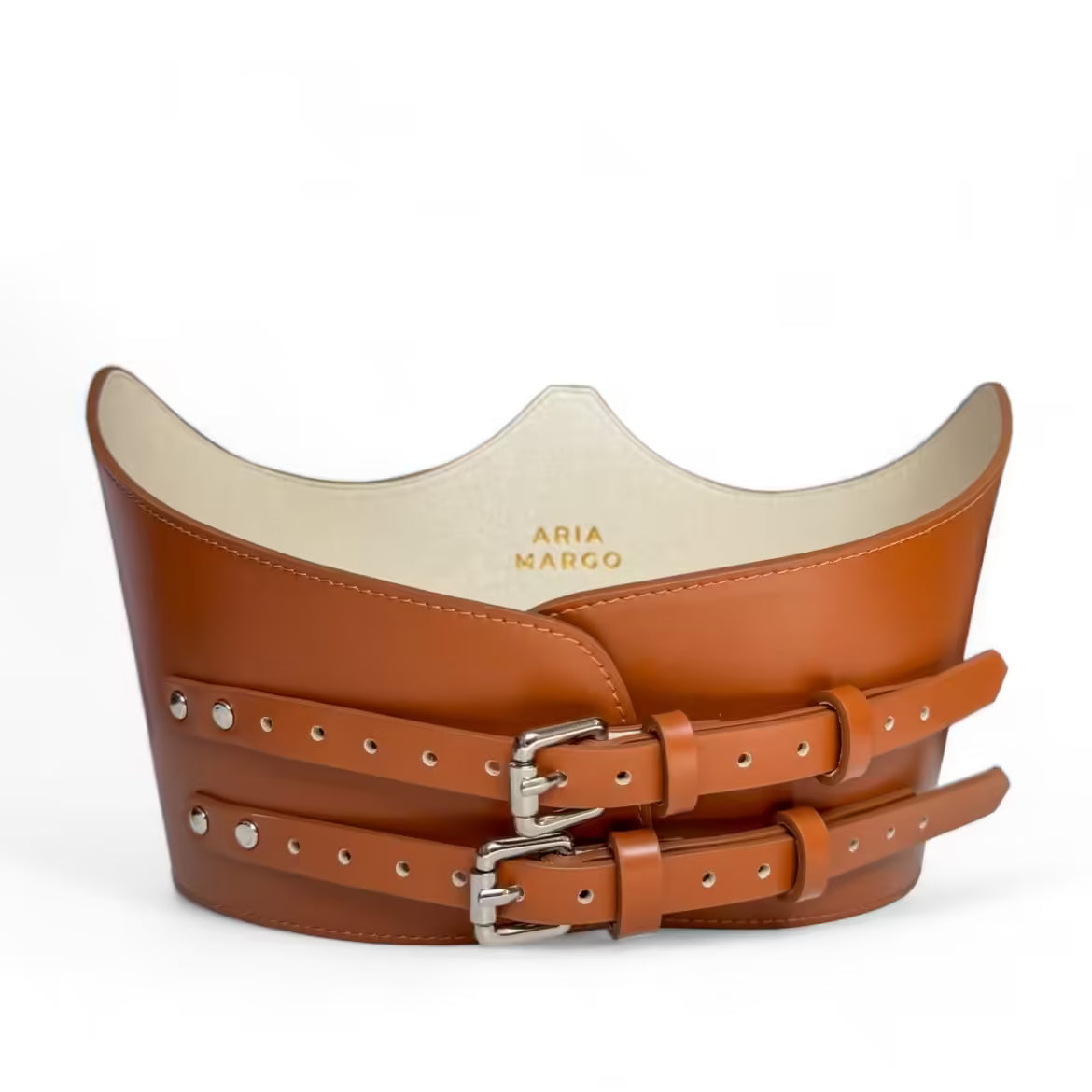 Aria Margo brown Italian leather under-bust belt with two adjustable silver buckles and a sculpted crown shape.