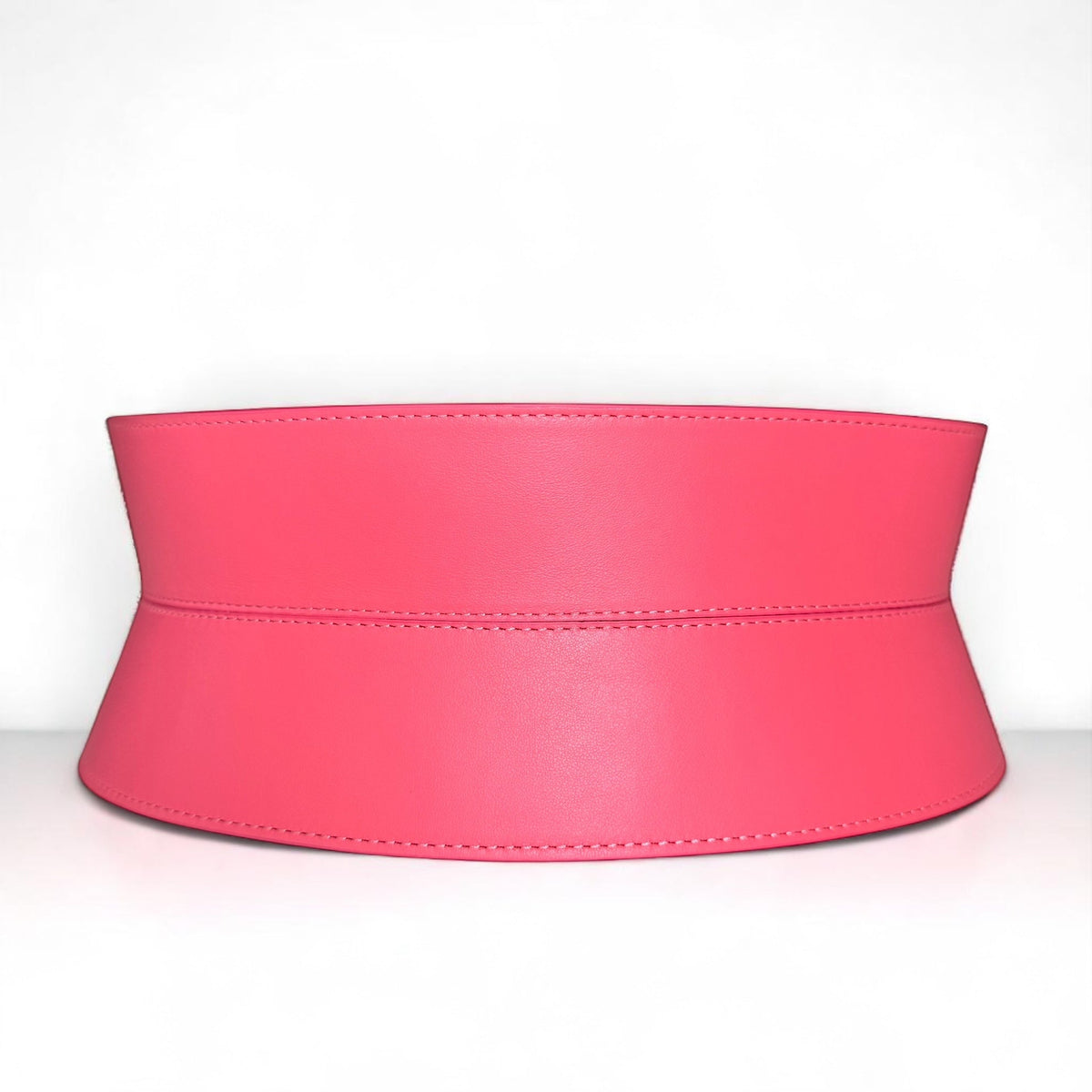 Aria Margo coral pink Italian leather corset belt with clean lines and a structured waist-defining design.