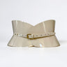 Aria Margo ivory patent leather hourglass corset belt with a high-shine finish and a slim gold-tone buckle.