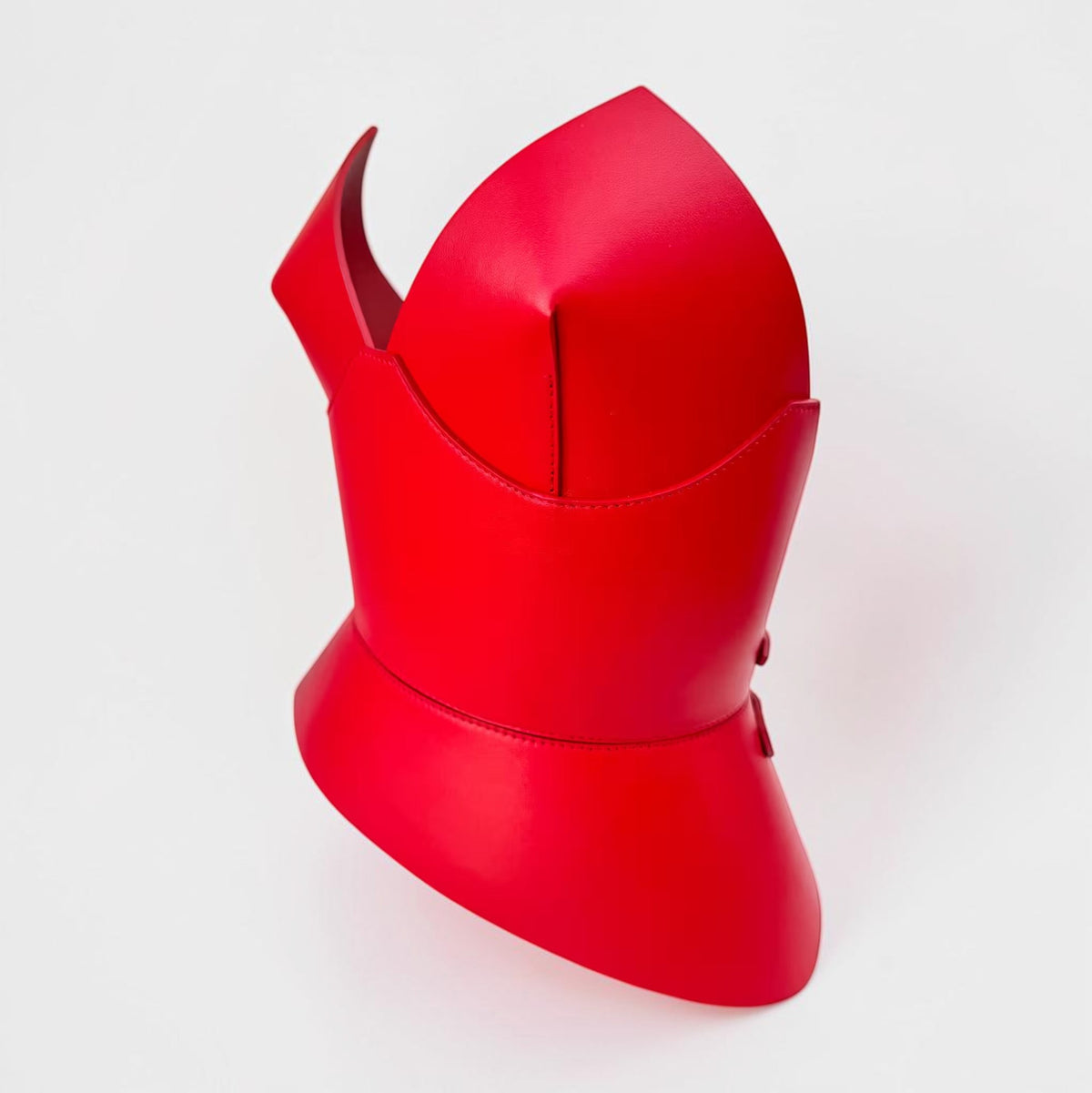 Aria Margo red Italian leather corset belt with a structured round body design and dual buckle closure.