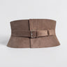 Aria Margo wide taupe suede leather corset belt with an adjustable buckle, featuring a structured hourglass shape.